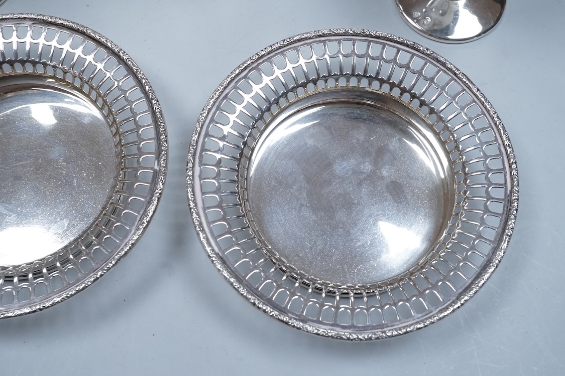 A pair of George VI silver bonbon dishes, by Davis, Duff & Son Birmingham, 1937, diameter 12.3cm, together with a set of six continental plated flutes.
